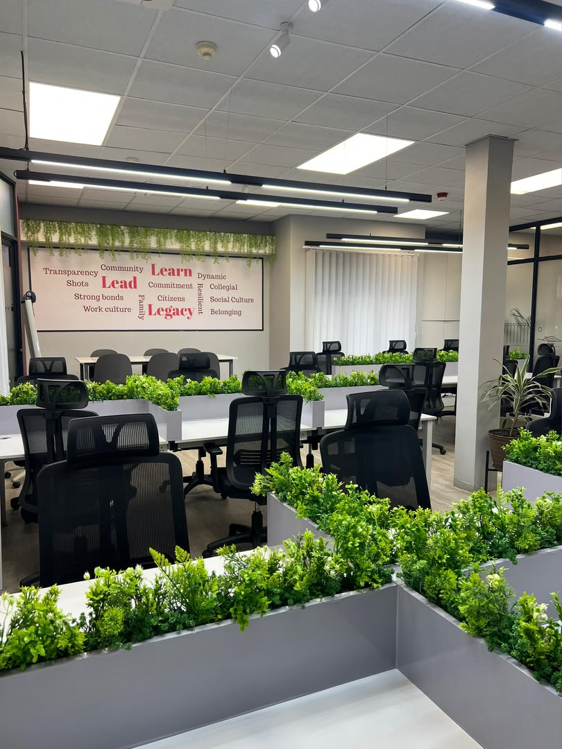 Open-plan workstations with planted dividers
